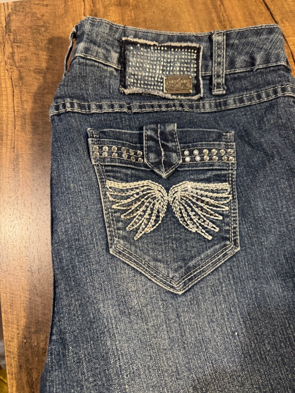 Women's Boot-Cut Jeans in Medium Blue with Studded Pocket Detail